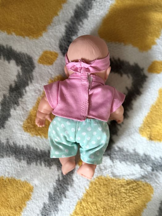 Пупс в рожевій картинці