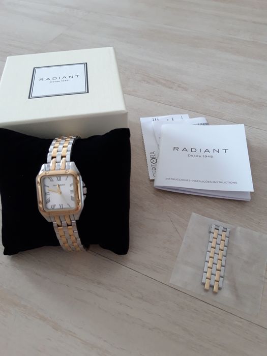 Relógio prateado e dourado Radiant