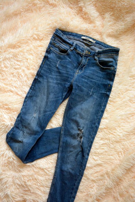 Spodnie jeansowe z dziurami Sinsay