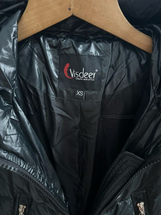 Зимова куртка , пуховик.