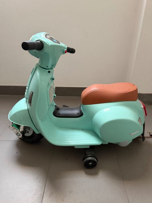 Scooter elétrica criança