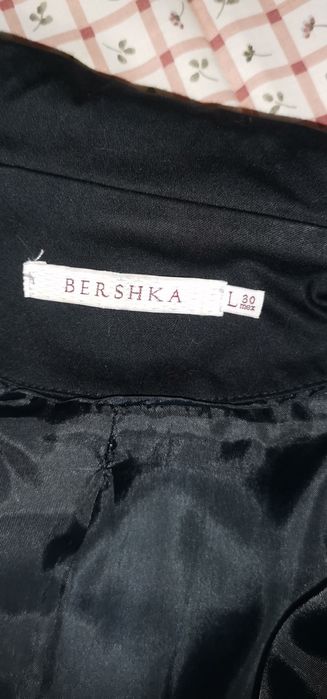 Blazer de mulher preto usado