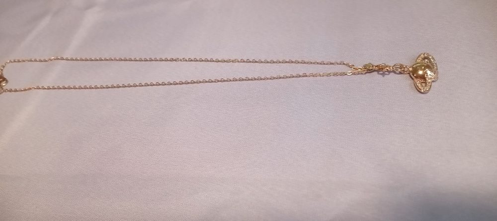 Продам на подарок цепочку с кулоном  52 см (бижутерия)