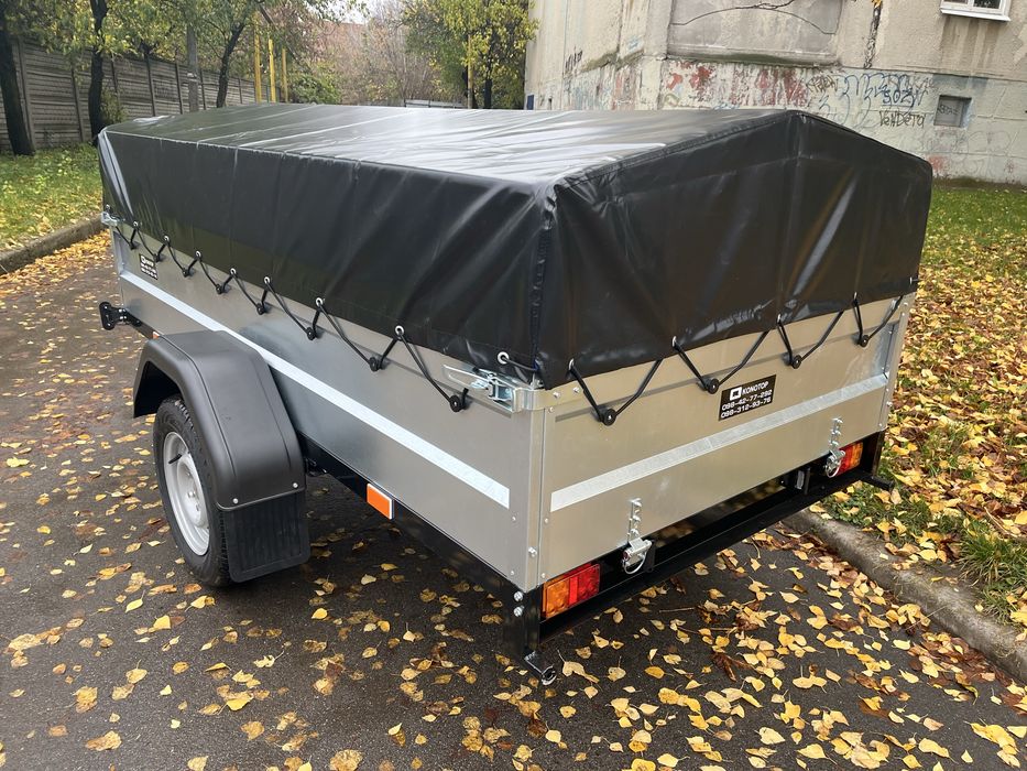 Причіп розміром 2.56 м Х 1.31 м Х 45 см