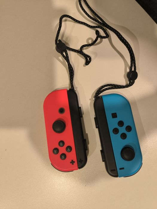 Nintendo Switch OLED with Neon Blue and Neon Red