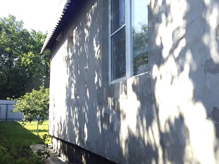 Поодам будинок Золочів