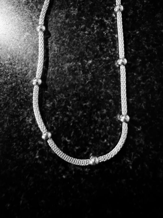 Fio de prata para senhora.