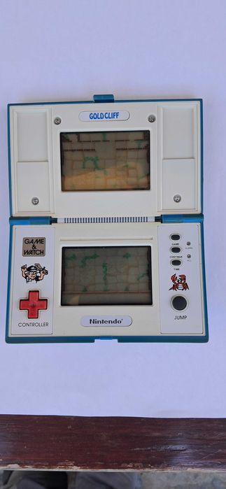 Nintendo GAME & WATCH multi screen gold cliff modelo MV64  1988