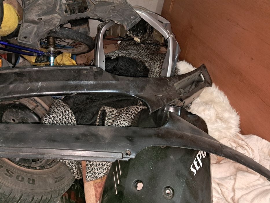 Цілим або Розбір сузукі сепіа зз мотор на ходу