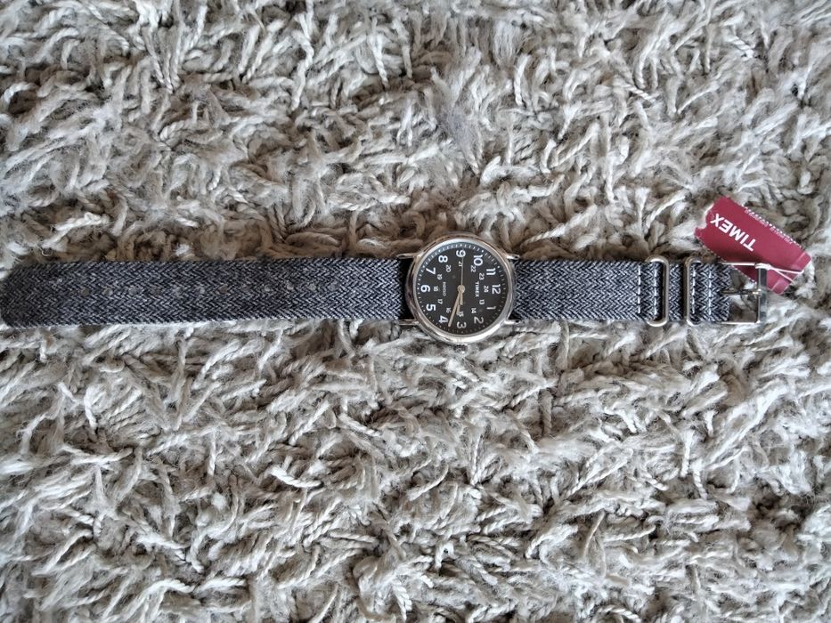 Relógio da Timex com bracelete em xadrez.64284974171010122