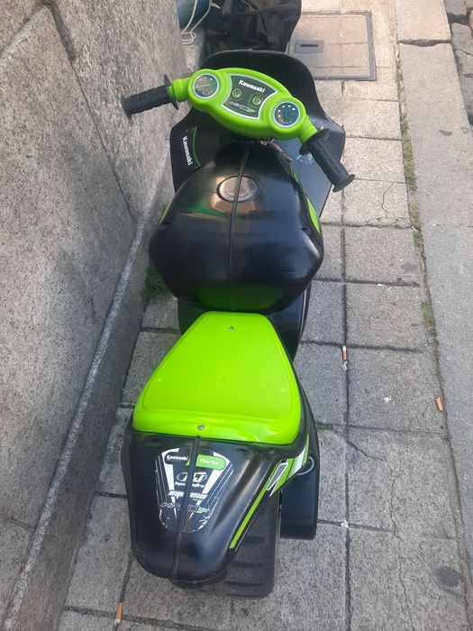 Moto kawasaki para criança a partir dos 3anos