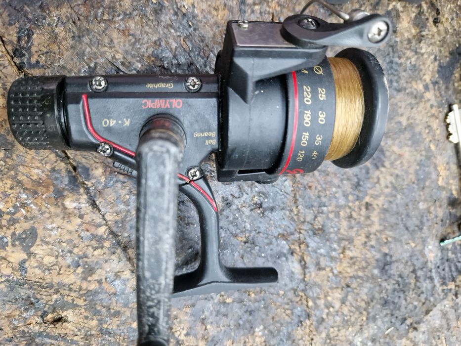 2 canas de pesca olympic(3.8.    3.9).      3 carretos