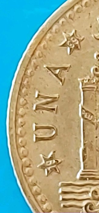 Una Peseta de 1966 com *69* na estrela, Espanha