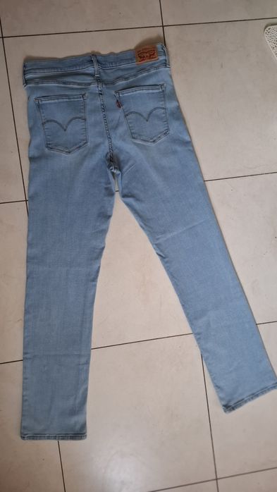 Jeansy "LEVI  STRAUSS"  W 32  L32  jasno niebieskie jak nowe