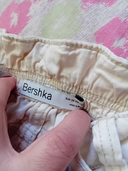 Piękne spodnie z kieszeniami szerokie 36