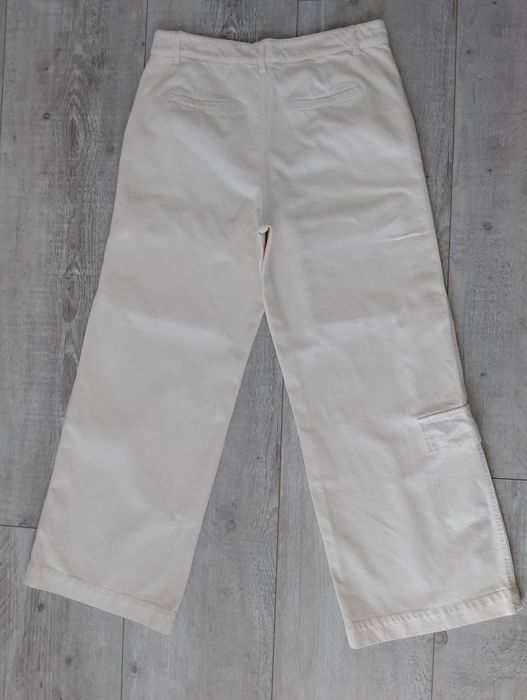 Nowe jeansy szerokie nogawki 44