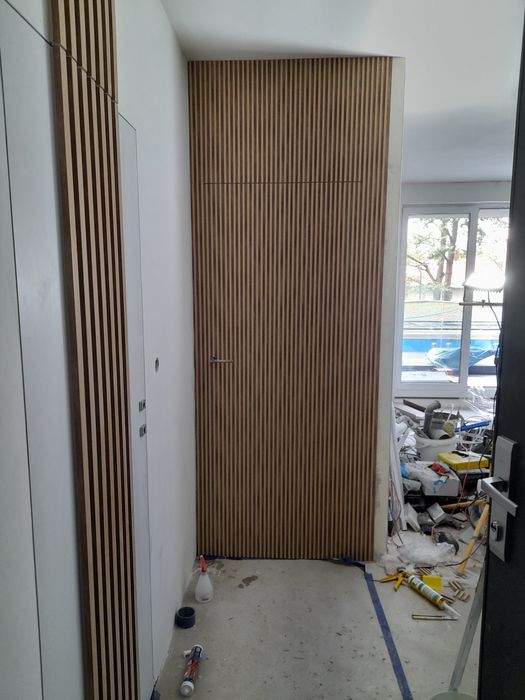 Montaż drzwi i paneli.drzwi zewnetrznych i P.Poz.Dopasowanie skrzydła