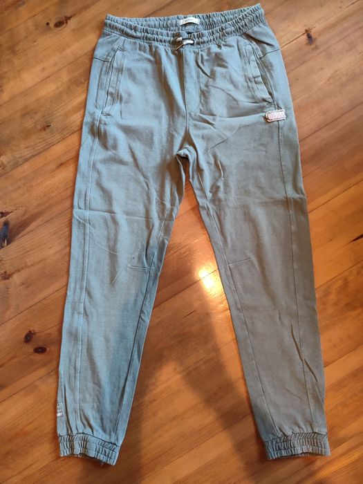 Чоловічі світло-зелені катонові джинси.