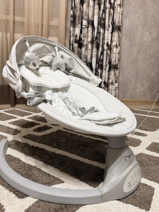 Заколисуючий центр гойдалка