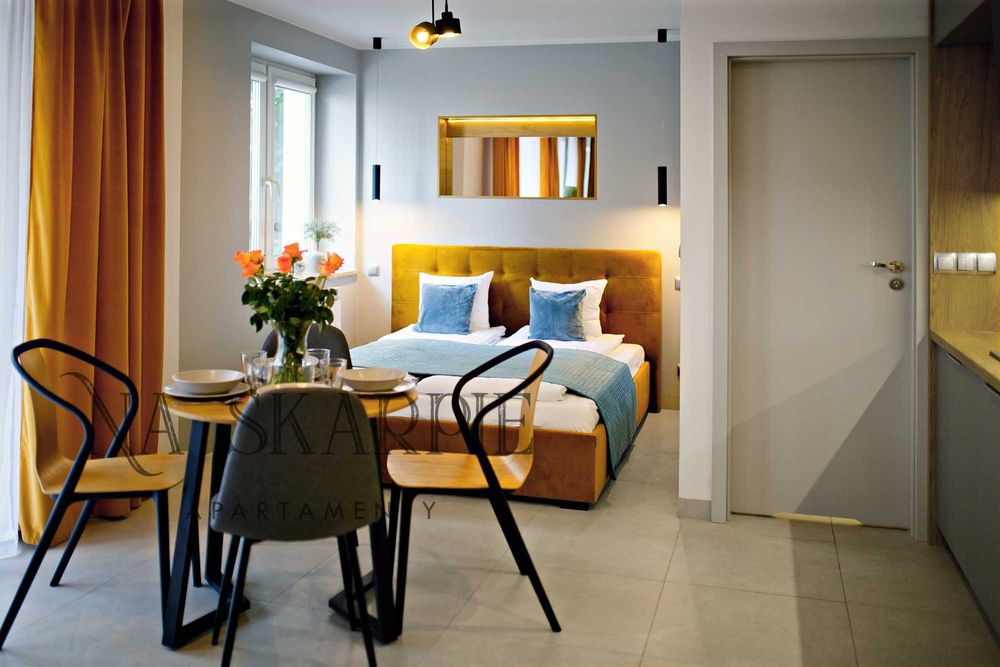 Apartament Na Skarpie 1 - noclegi nad jeziorem, promenada, Mazury