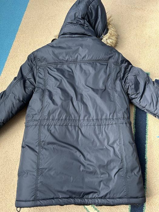 Зимовий довгий пуховик