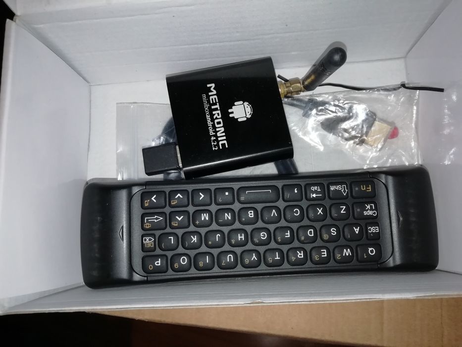 Box tv android com comando com avaria