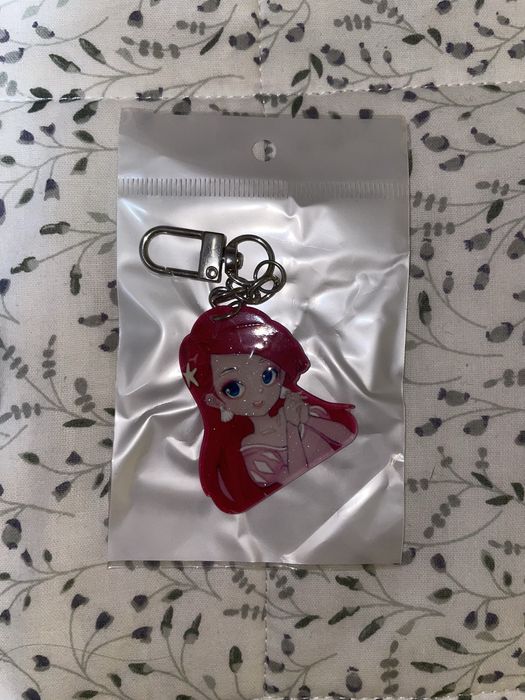 Estojo Ariel novo (oferta de porta-chaves)