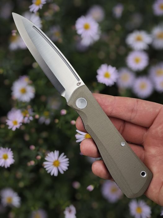 Ніж складний Gerber Mansfield , замок Slip Joint, накладки Natural Micarta , клинок D2,полировка Satin, упаковано в коробку.