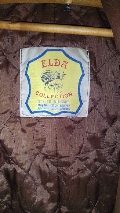 Кожана курточка.