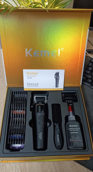 Kemei машинка професійна