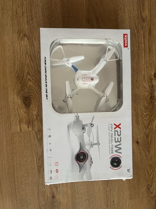 Дрон  zyma x23w.