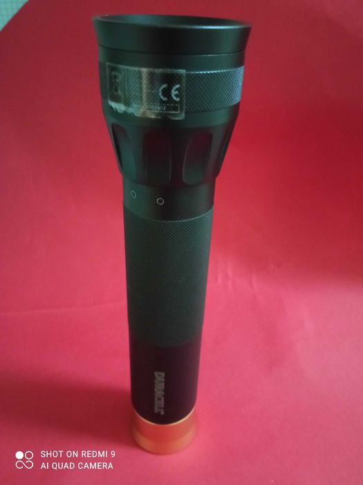 LANTERNA  "Duracell" - Preto e Dourada430452233523046402