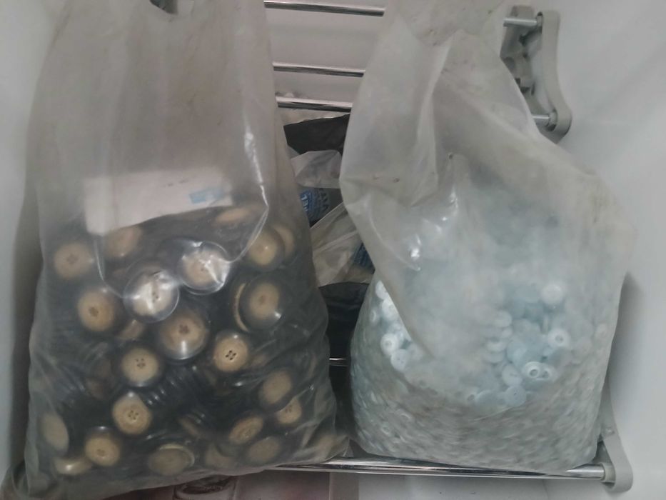 Sacos de botões novos