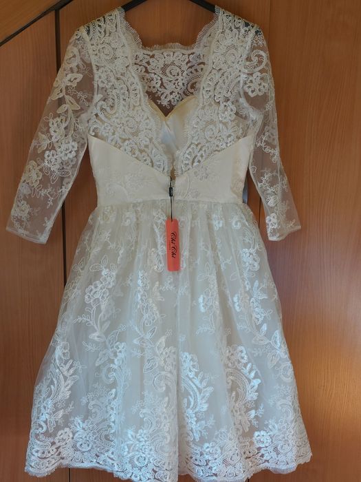 Suknia ślubna kremowa midi r.38"Chi Chi London " nowa