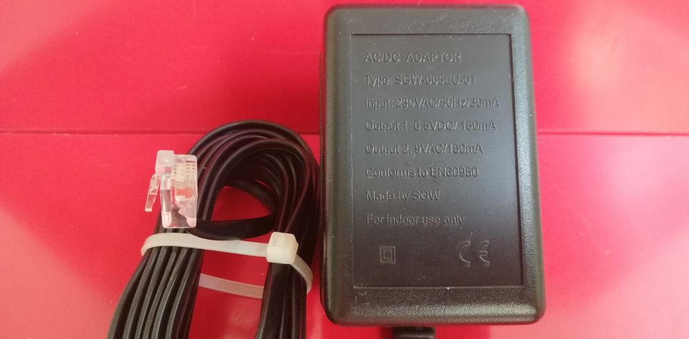 Блок питания SGW-065EU-01 два напряжения постоян. ток 6.5V и перем. 9V