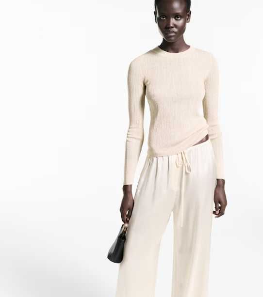 Camisola de lurex com gola redonda