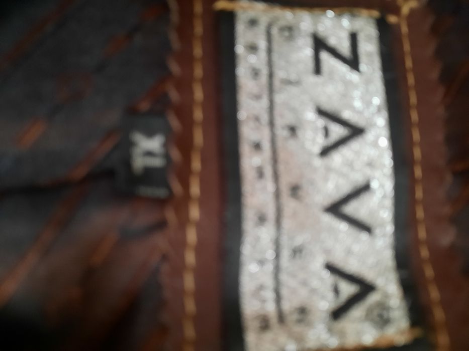 Шкіряна ,стильна куртка