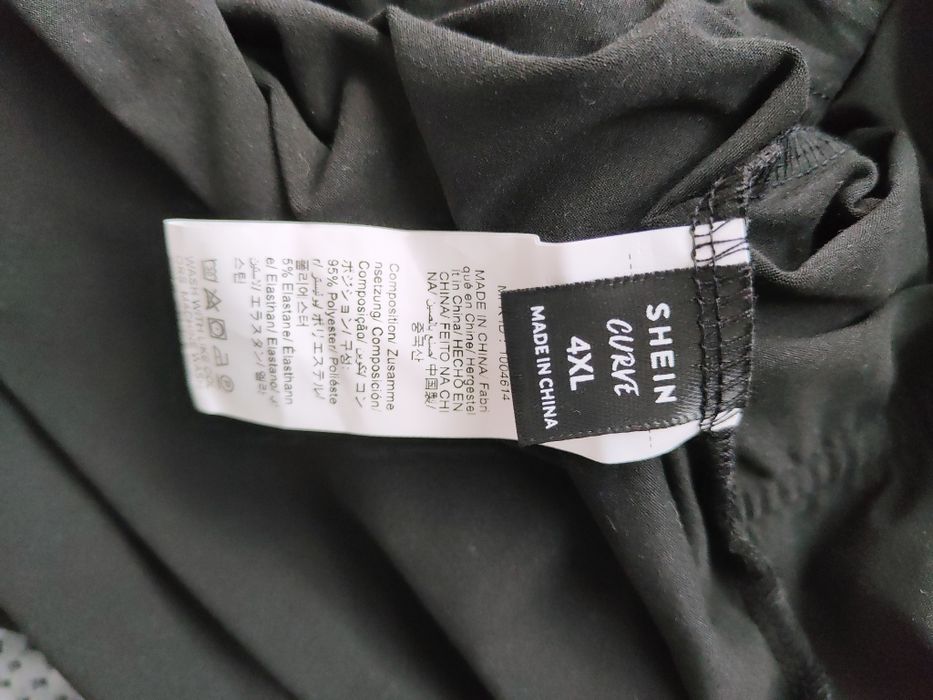 Sukienka midi czarna ołówkowa z frędzlami ażurowa  nowa rozmiar 48