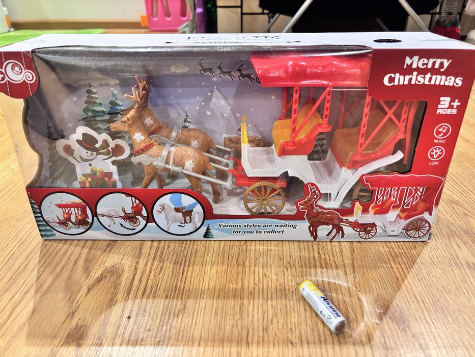 Іграшка дитяча музикальна новорічна карета з оленями