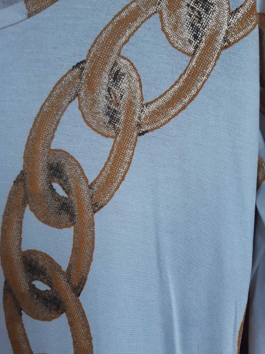 Biała Sukienka z wzorem roz. 36-38