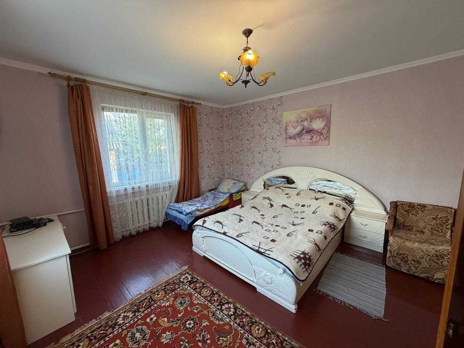Затишний будинок та 33 сотки землі в межах міста
