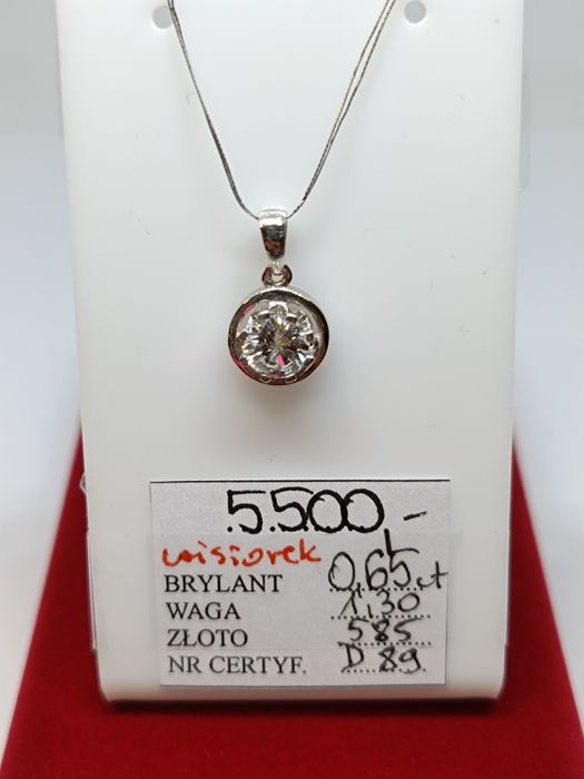 Złoty wisiorek z brylantem, złoto białe próby 585