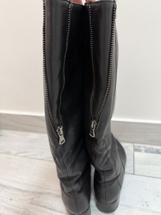 Шкіряні високі чоботи