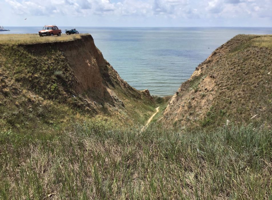 Земельный участок с Рыбаковка первая линия