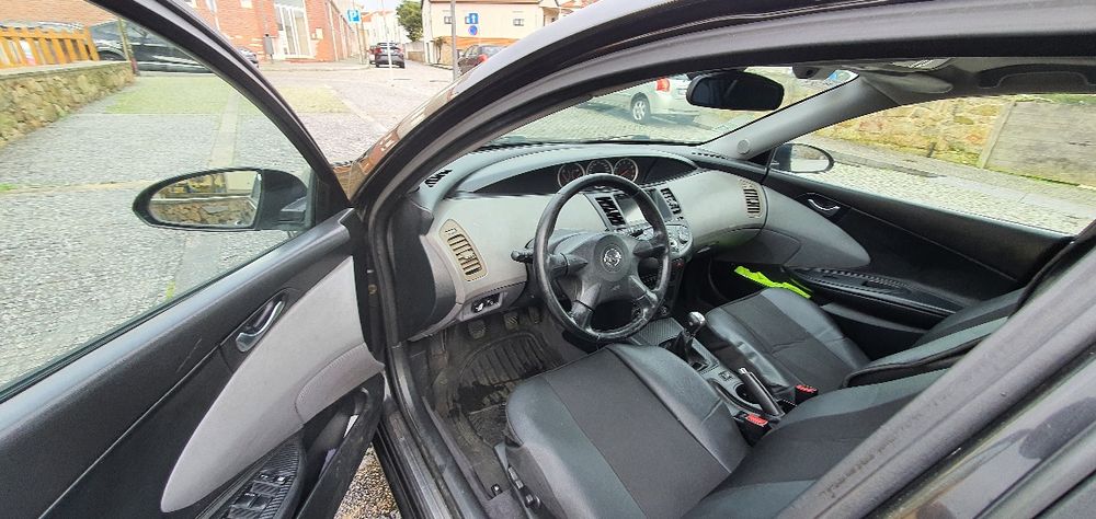 Nissan Primera P12 a GPL/1,6 Gasolina