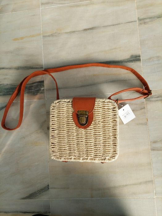 Mala a tiracolo ajustável