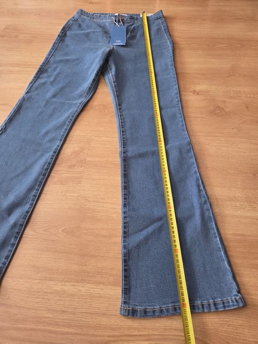 Nowe dżinsy dzwony Sinsay L/XL