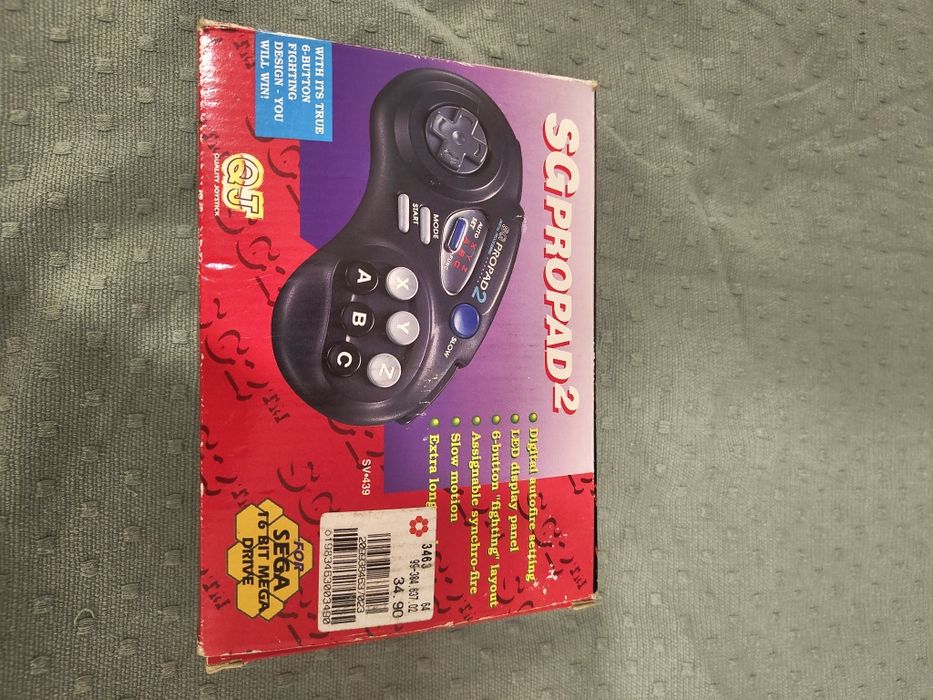 Comando Mega Drive em caixa