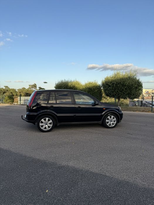 Ford Fusion 1.25    (gasolina)