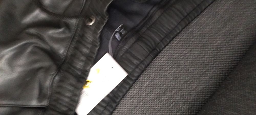 Czarne nowe skórzane cieple spodnie/getry